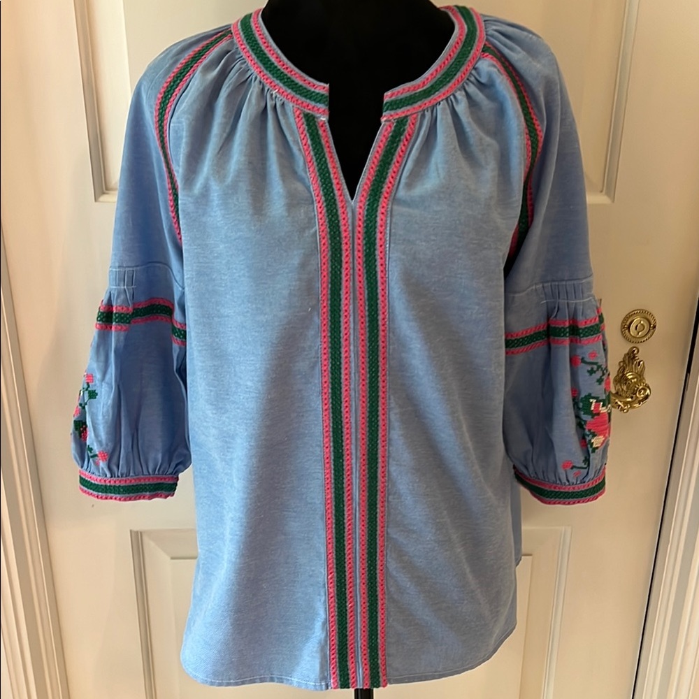 Embroidered blouse.